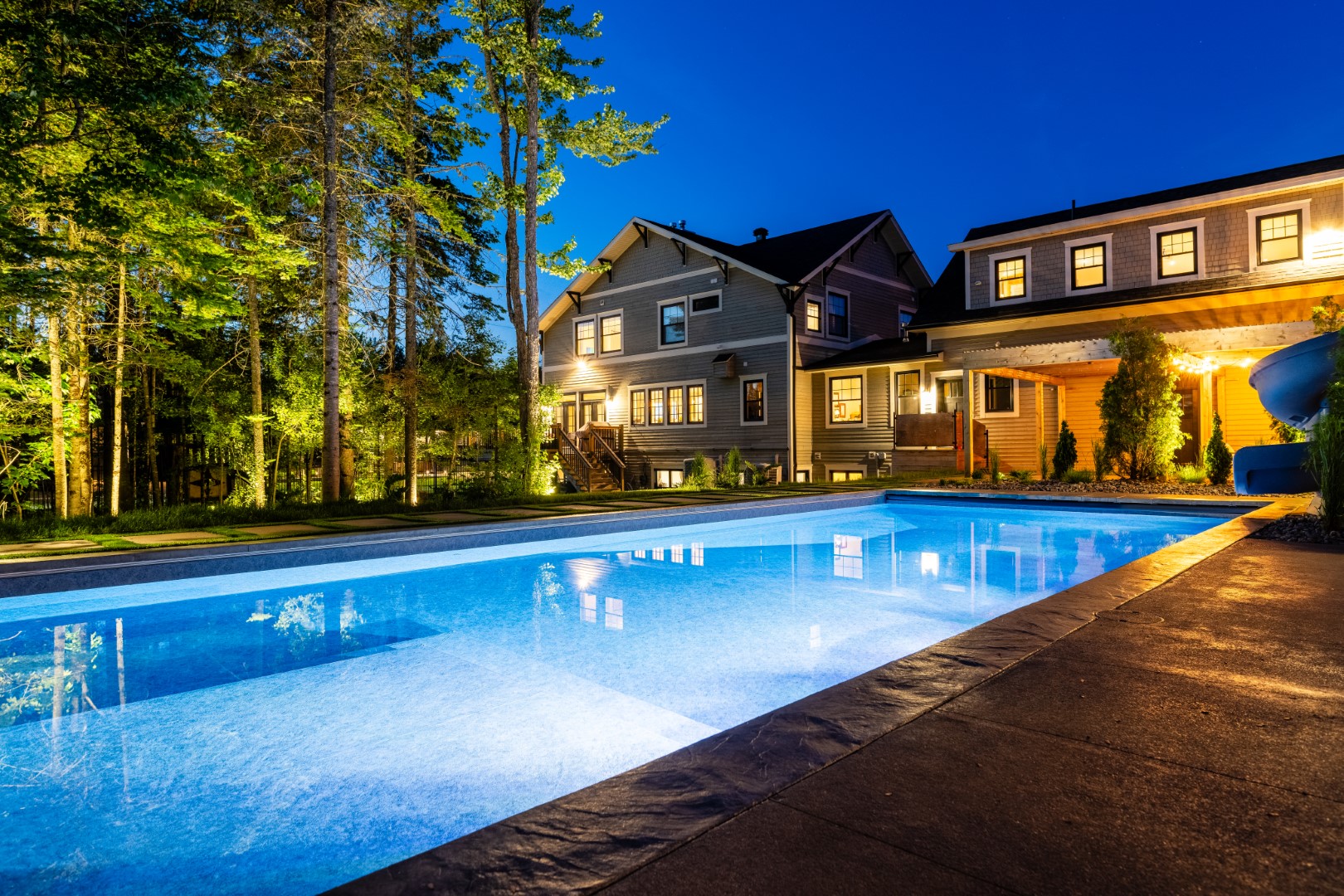 Swimming pool with custom lighting at night